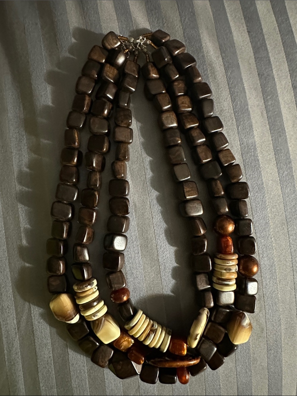 Multi-Strand Brown Bead Necklace with Cream Accents